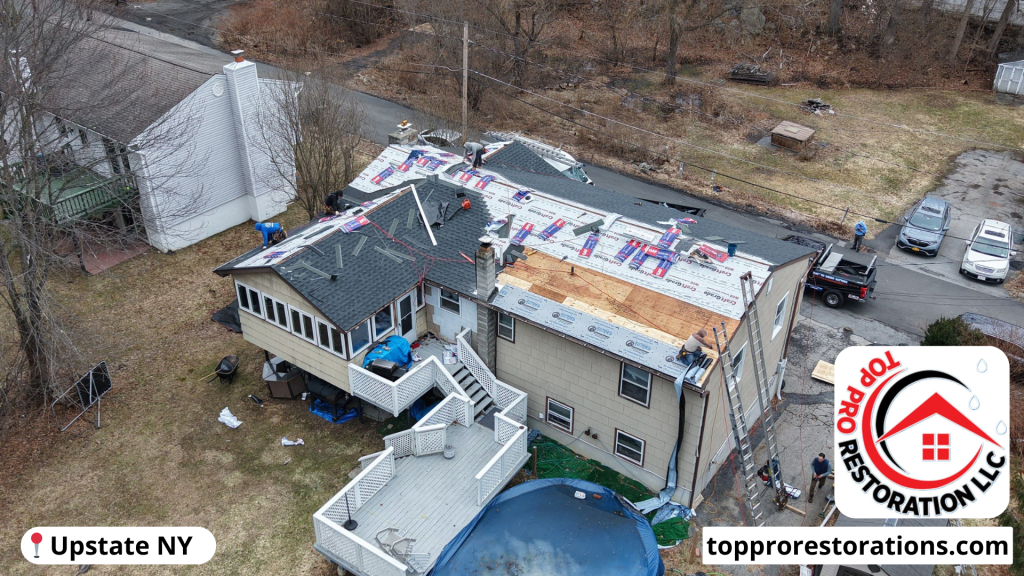Picture of a roof being repaired by a roof company