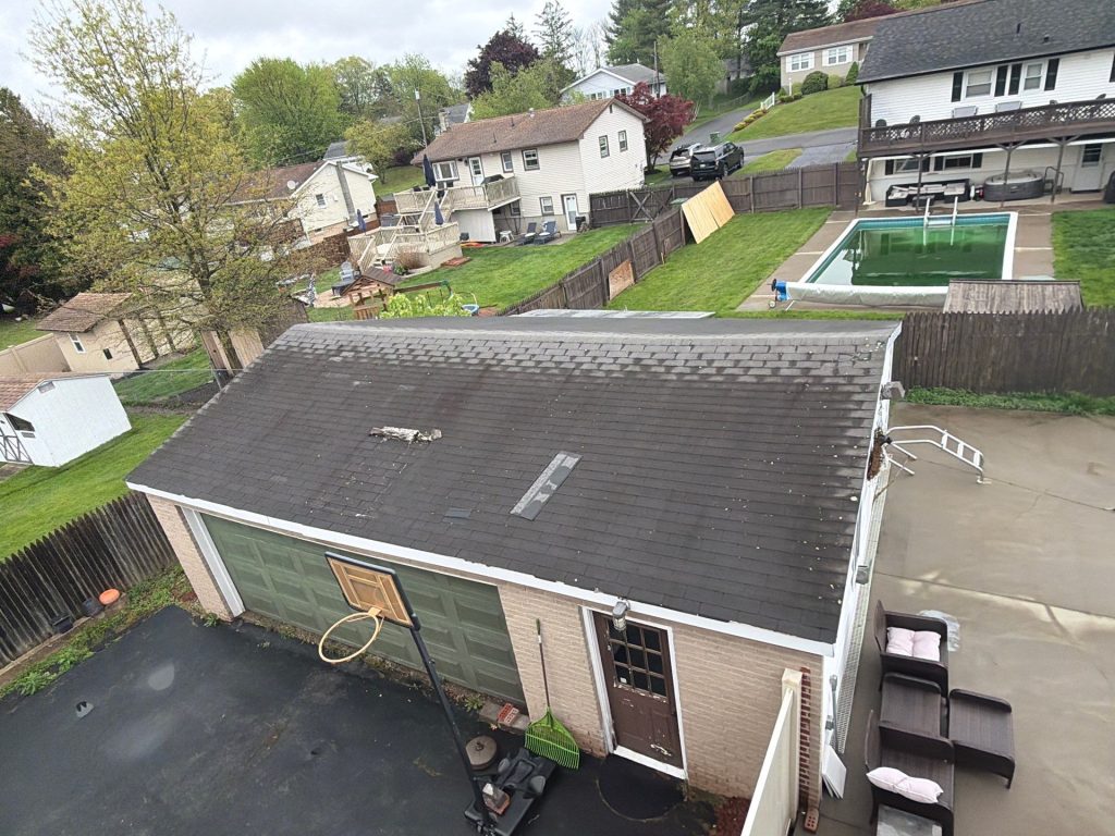 Picture showing a roof with signs of wear and tear in Upstate NY